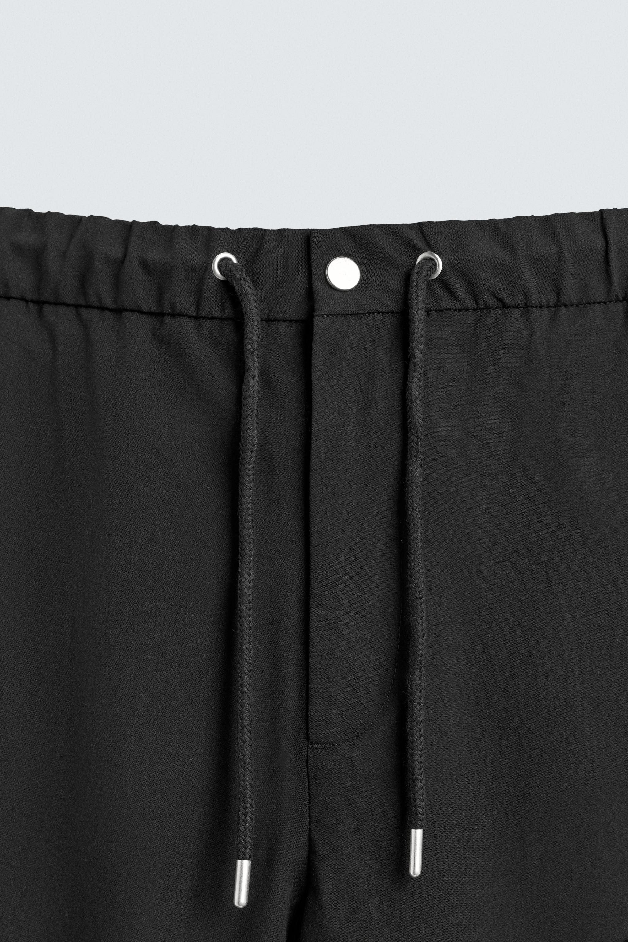 RELAXED FIT TECHNICAL SHORTS